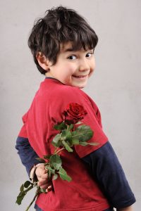 Great Gifts for Mom boy hiding a rose